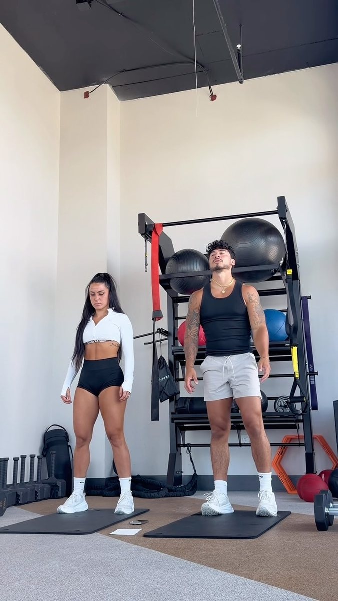 Ben and Jenny in their home gym